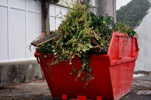 Sorting rubbish for recycling during a clearance job